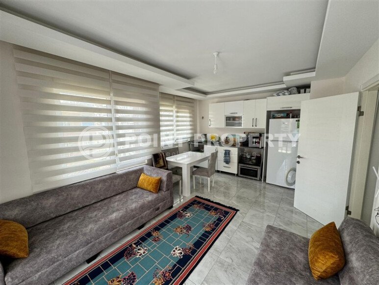 Бюджетная квартира 1+1 площадью 55 м² в районе Махмутлар рядом с морем-id-9502-фото-2