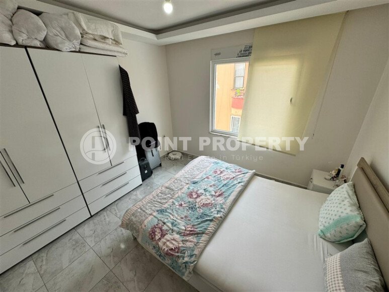 Бюджетная квартира 1+1 площадью 55 м² в районе Махмутлар рядом с морем-id-9502-фото-5