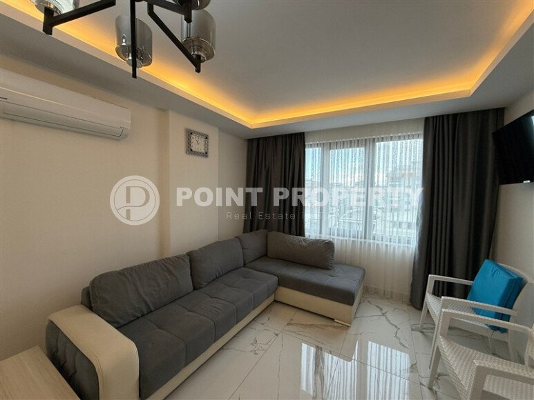 Просторная квартира 1+1 площадью 70 м² в престижном комплексе в районе Махмутлар-id-9507-фото-3