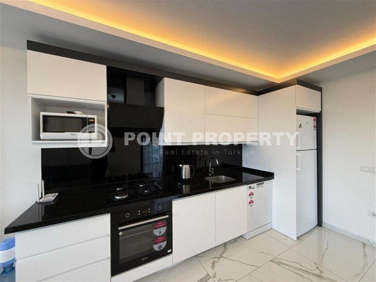 Просторная квартира 1+1 площадью 70 м² в престижном комплексе в районе Махмутлар-id-9507-фото-4