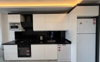 Просторная квартира 1+1 площадью 70 м² в престижном комплексе в районе Махмутлар-id-9507-фото-5