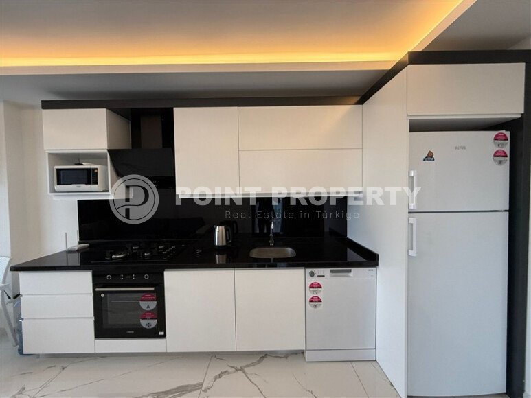 Просторная квартира 1+1 площадью 70 м² в престижном комплексе в районе Махмутлар-id-9507-фото-5