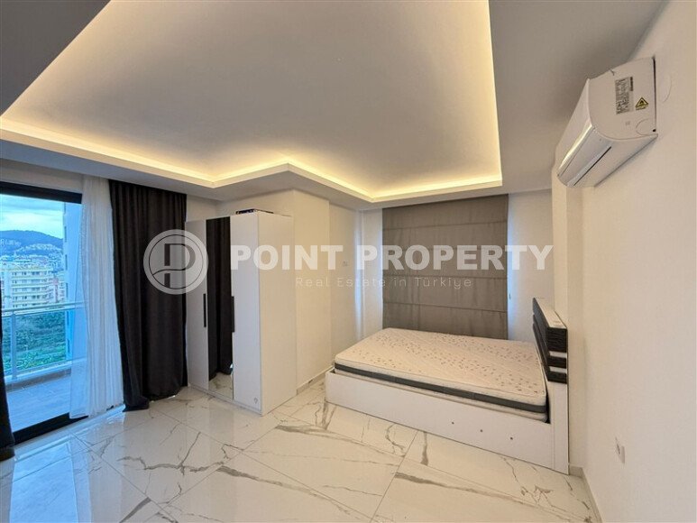 Просторная квартира 1+1 площадью 70 м² в престижном комплексе в районе Махмутлар-id-9507-фото-6