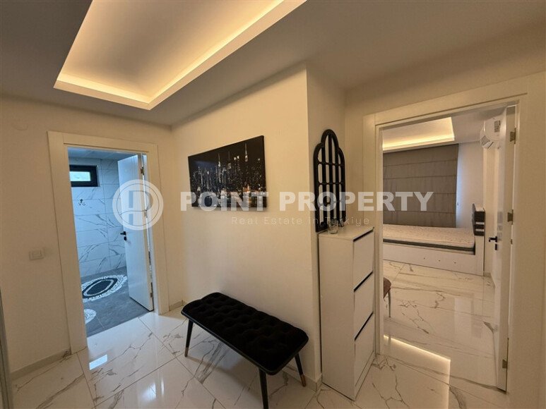 Просторная квартира 1+1 площадью 70 м² в престижном комплексе в районе Махмутлар-id-9507-фото-7