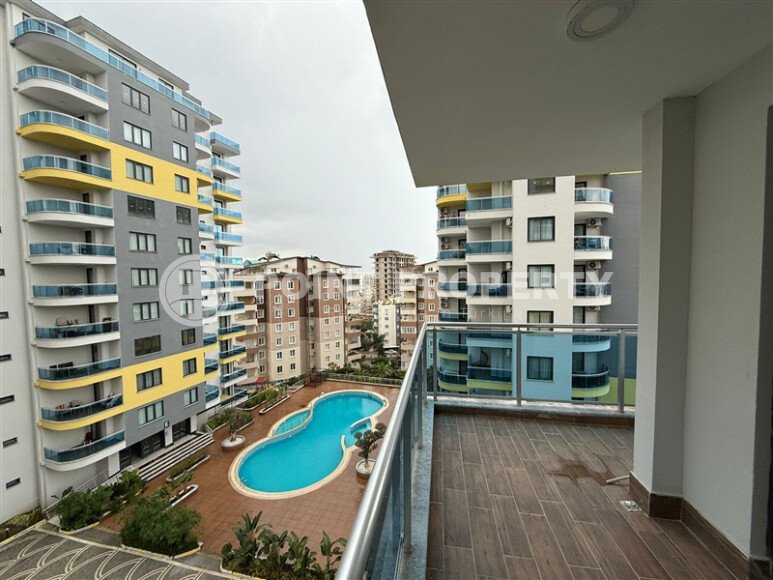 Просторная квартира 1+1 площадью 70 м² в престижном комплексе в районе Махмутлар-id-9507-фото-10