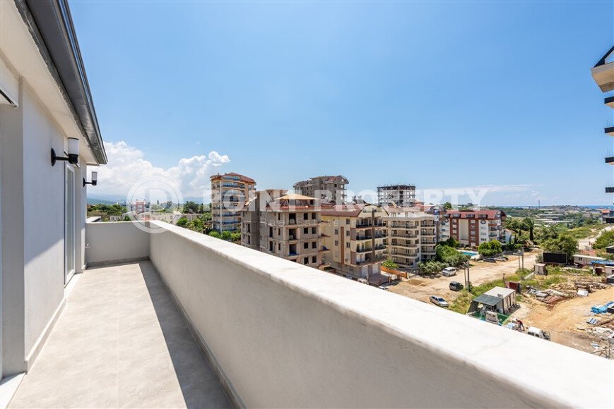 Penthouse 2+1 with a beautiful view in a new complex in Avsallar-id-9512-photo-9