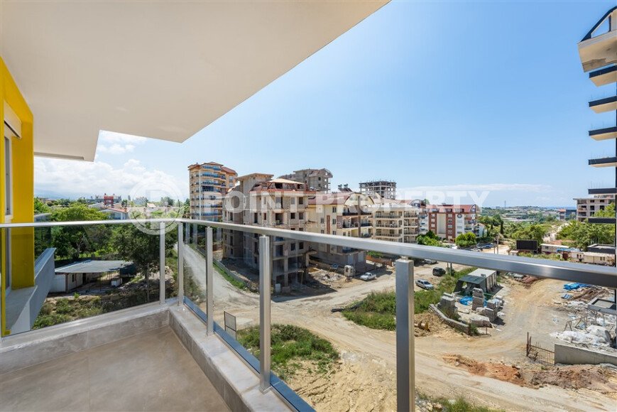 Penthouse 2+1 with a beautiful view in a new complex in Avsallar-id-9512-photo-11