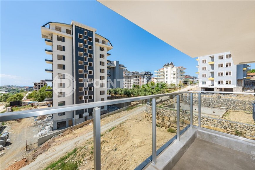 Penthouse 2+1 with a beautiful view in a new complex in Avsallar-id-9512-photo-12