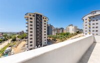 Penthouse 2+1 with a beautiful view in a new complex in Avsallar-id-9512-photo-13