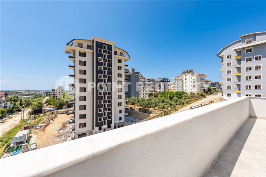 Penthouse 2+1 with a beautiful view in a new complex in Avsallar-id-9512-photo-13