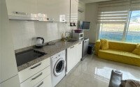 Квартира в комплексе с отельной инфраструктурой в 500 метрах от море в районе Махмутлар-id-9515-фото-3