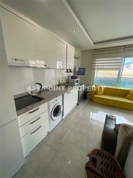 Квартира в комплексе с отельной инфраструктурой в 500 метрах от море в районе Махмутлар-id-9515-фото-3