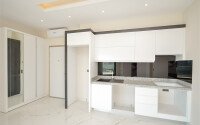 Просторная квартира 1+1 площадью 65 м² в престижном комплексе в районе Каргыджак-id-9521-фото-2
