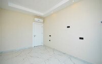 Просторная квартира 1+1 площадью 65 м² в престижном комплексе в районе Каргыджак-id-9521-фото-7