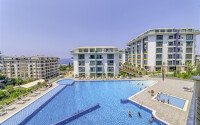 Просторная квартира 1+1 площадью 65 м² в престижном комплексе в районе Каргыджак-id-9521-фото-32
