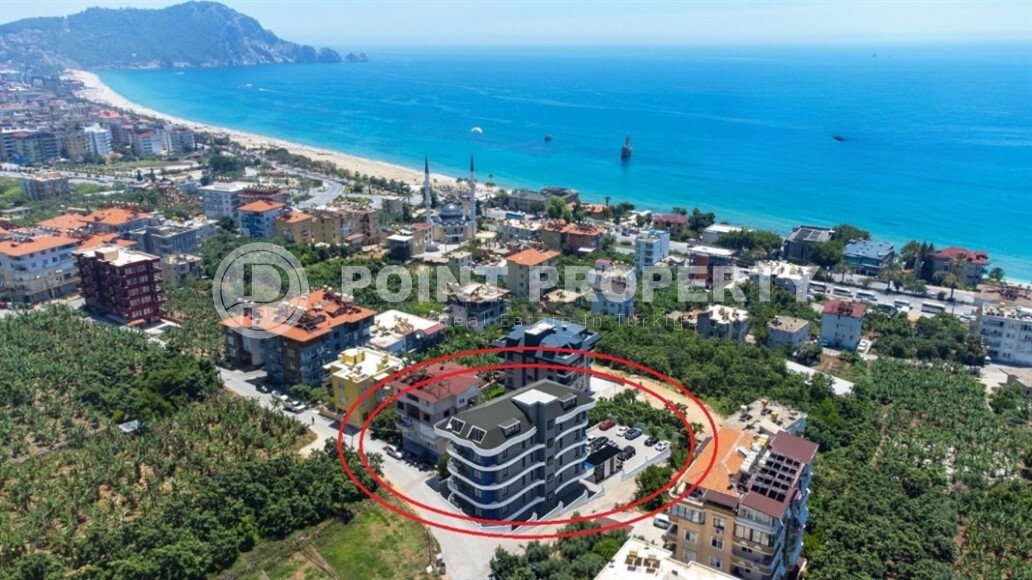 Квартиры с хорошей площадью в новом жилом комплексе в рассрочку в районе Динек, Алания-id-9522-фото-1