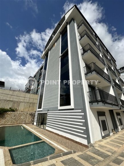 1+1 apartment with an area of 45 m² in the Ciplakli area with the possibility of obtaining a residence permit-id-9523-photo-1