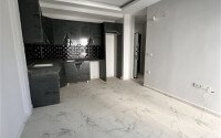 1+1 apartment with an area of 45 m² in the Ciplakli area with the possibility of obtaining a residence permit-id-9523-photo-4