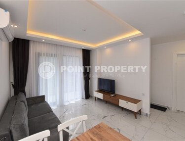 Квартира 1+1 в современном комплексе в центре Алании-id-9526-фото-3