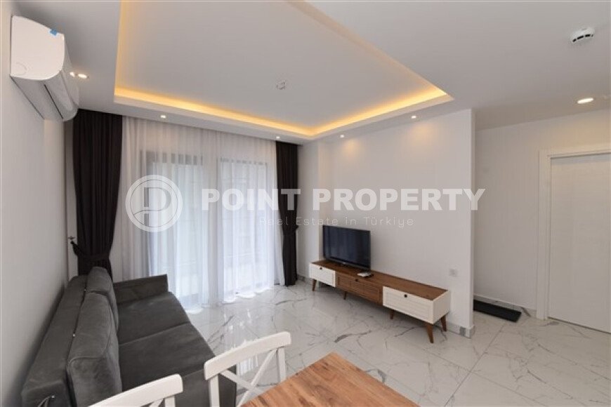 Apartment 1+1 in a modern complex in the center of Alanya-id-9526-photo-3
