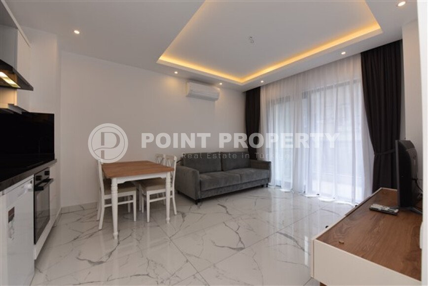 Apartment 1+1 in a modern complex in the center of Alanya-id-9526-photo-4