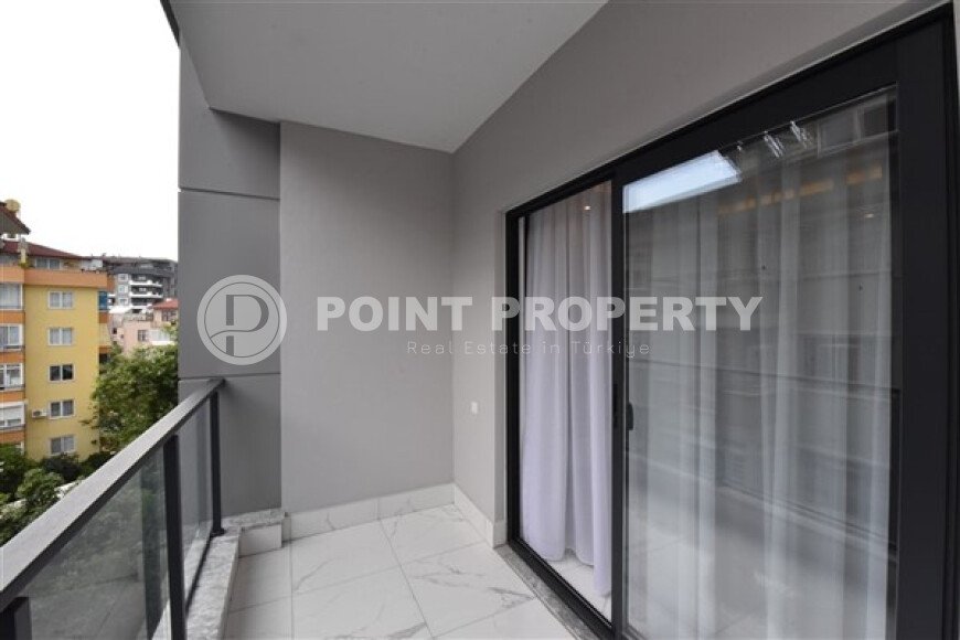 Apartment 1+1 in a modern complex in the center of Alanya-id-9526-photo-11