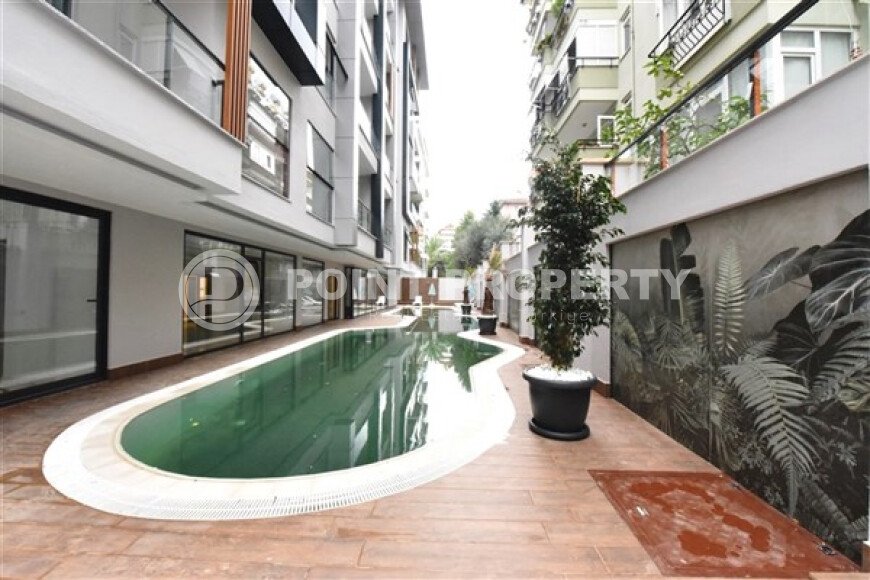 Apartment 1+1 in a modern complex in the center of Alanya-id-9526-photo-17