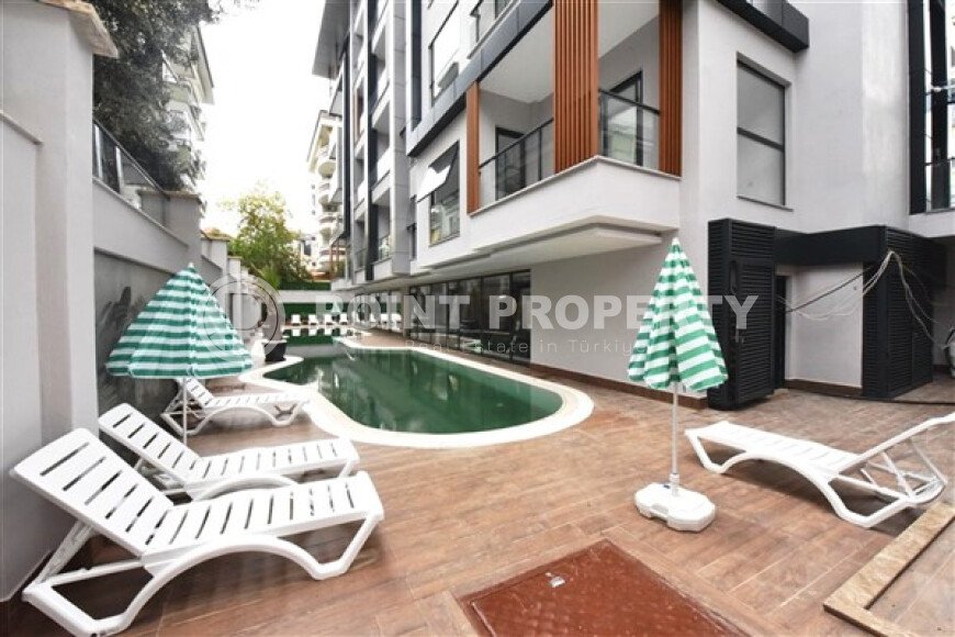 Apartment 1+1 in a modern complex in the center of Alanya-id-9526-photo-18