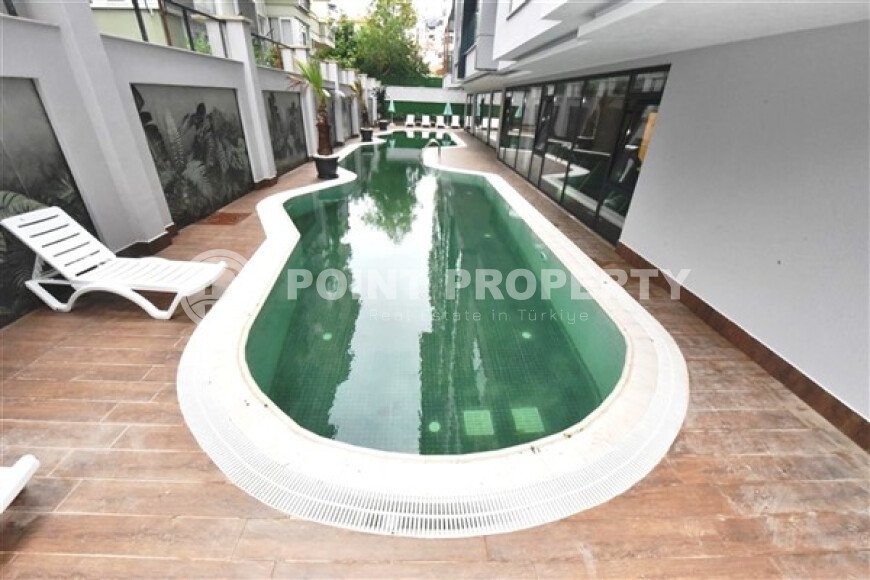 Apartment 1+1 in a modern complex in the center of Alanya-id-9526-photo-19