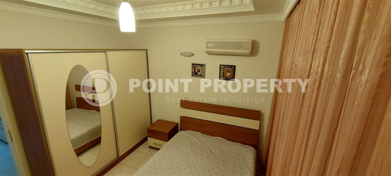 Spacious apartment with furniture and appliances in the Mahmutlar area, in a complex with a huge territory and developed infrastructure.-id-9535-photo-12