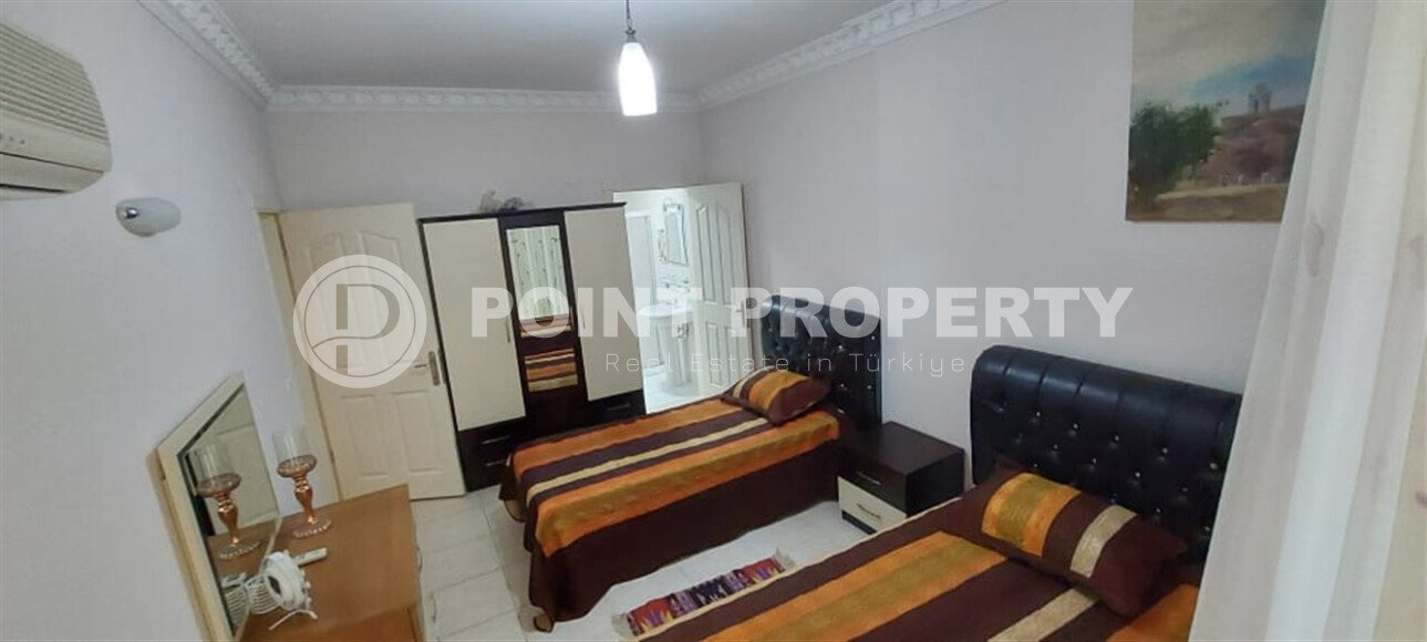 Spacious apartment with furniture and appliances in the Mahmutlar area, in a complex with a huge territory and developed infrastructure.-id-9535-photo-16