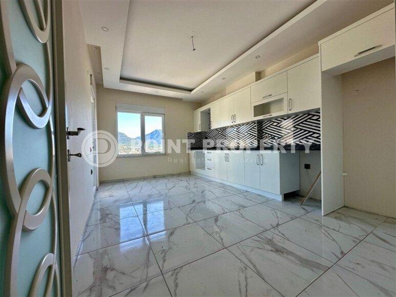 Просторная квартира 3+1 площадью 150 м² с отдельной кухней в районе Бюйюкхасбахче, Алания-id-9536-фото-2