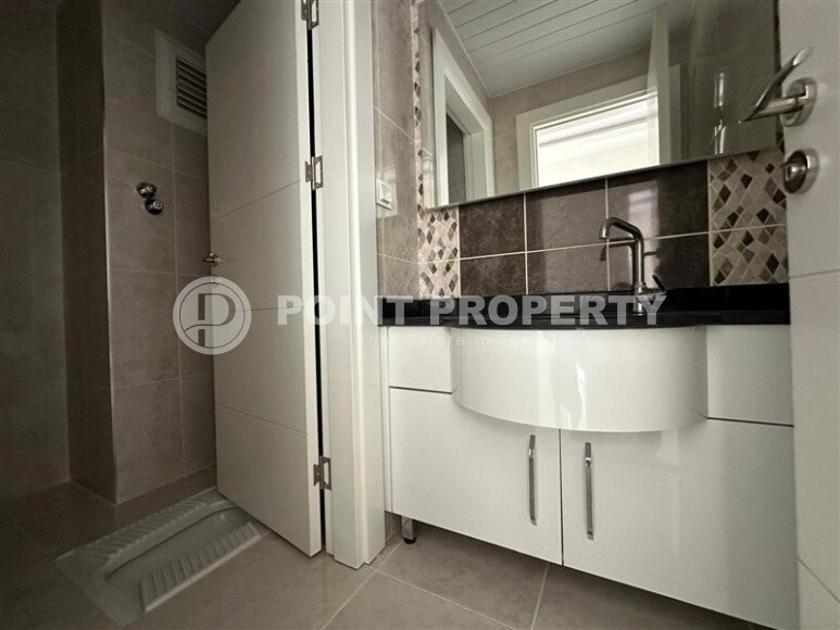 Просторная квартира 3+1 площадью 150 м² с отдельной кухней в районе Бюйюкхасбахче, Алания-id-9536-фото-10