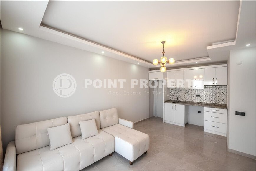 Bright apartment with new furniture in the Canals area, in a complex with a large green area, close to the sea.-id-9540-photo-1