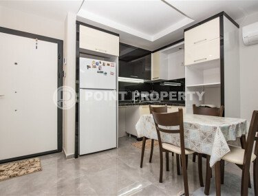 Просторная квартира 58 м² в районе Махмутлар с застекленным балконом-id-9543-фото-3