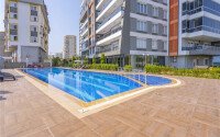 Комфортная квартира 4+1, 180 м² в районе Махмутлар с отдельной кухней и видом на море-id-9544-фото-1