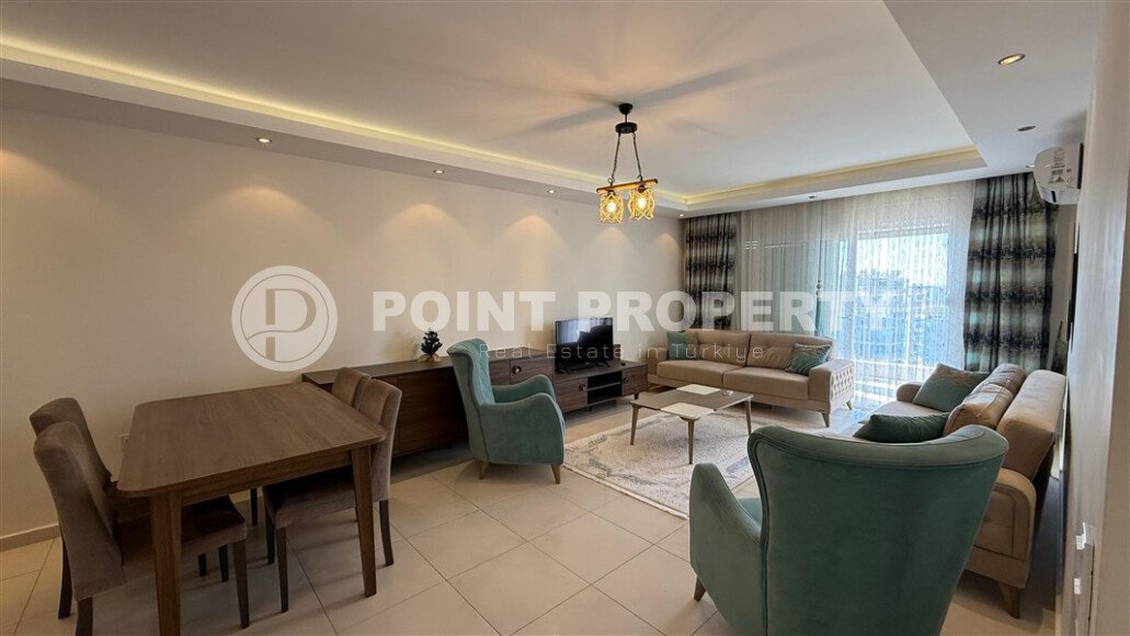 Меблированная квартира планировки 1+1  в районе Махмутлар, в комплексе с зеленой территорией иинфраструктурой.-id-9545-фото-2