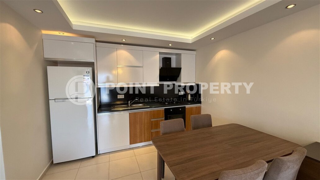 Меблированная квартира планировки 1+1  в районе Махмутлар, в комплексе с зеленой территорией иинфраструктурой.-id-9545-фото-3