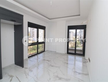 Новая квартира 50 м² на центральной улице в районе Махмутлар-id-9546-фото-2