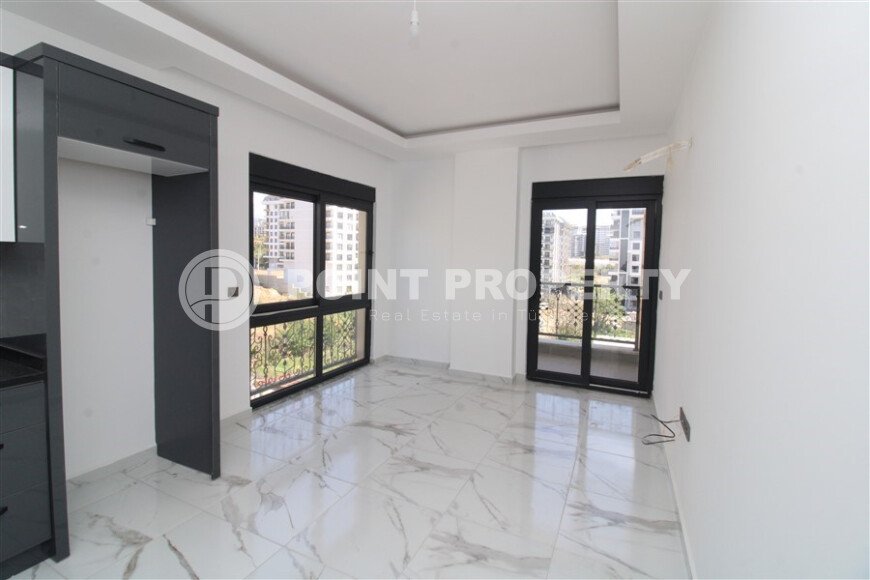 Новая квартира 50 м² на центральной улице в районе Махмутлар-id-9546-фото-2