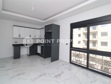 Новая квартира 50 м² на центральной улице в районе Махмутлар-id-9546-фото-3