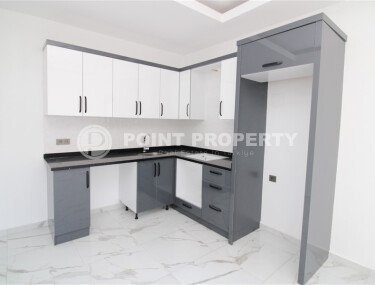 Новая квартира 50 м² на центральной улице в районе Махмутлар-id-9546-фото-4