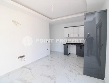 Новая квартира 50 м² на центральной улице в районе Махмутлар-id-9546-фото-5