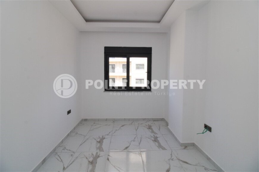 Новая квартира 50 м² на центральной улице в районе Махмутлар-id-9546-фото-6