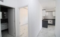 Новая квартира 50 м² на центральной улице в районе Махмутлар-id-9546-фото-8