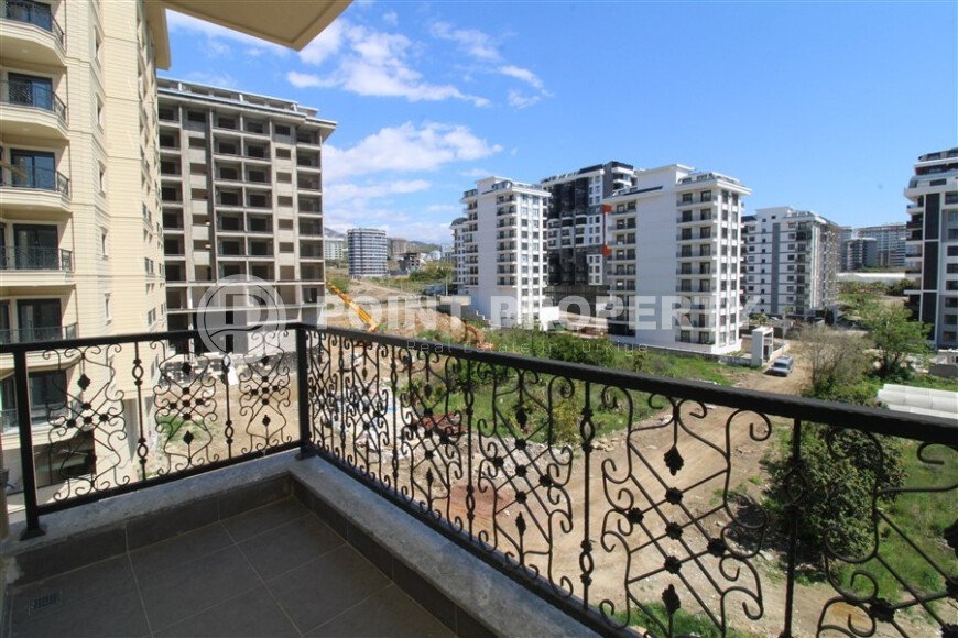 Новая квартира 50 м² на центральной улице в районе Махмутлар-id-9546-фото-10