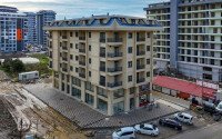 Новая квартира 50 м² на центральной улице в районе Махмутлар-id-9546-фото-13