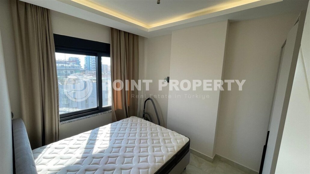 Sunny apartment 50 m² with sea views in a premium complex in Mahmutlar-id-9547-photo-6