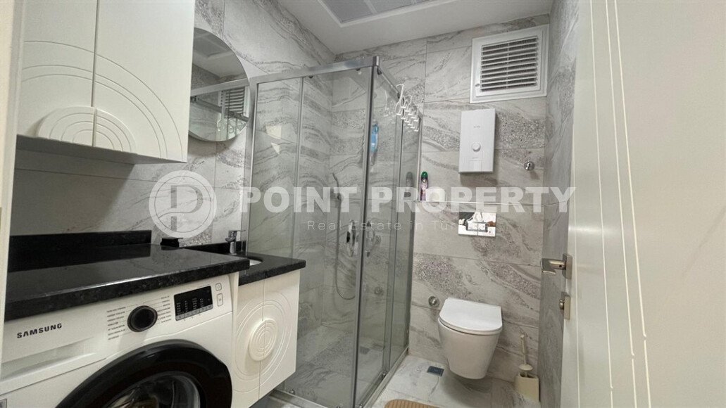 Sunny apartment 50 m² with sea views in a premium complex in Mahmutlar-id-9547-photo-7