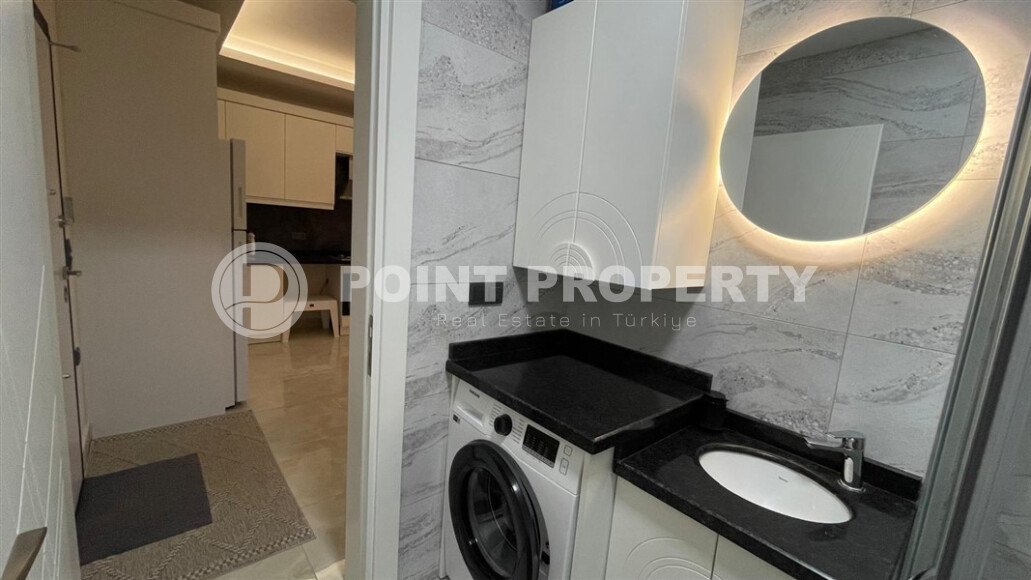 Sunny apartment 50 m² with sea views in a premium complex in Mahmutlar-id-9547-photo-8